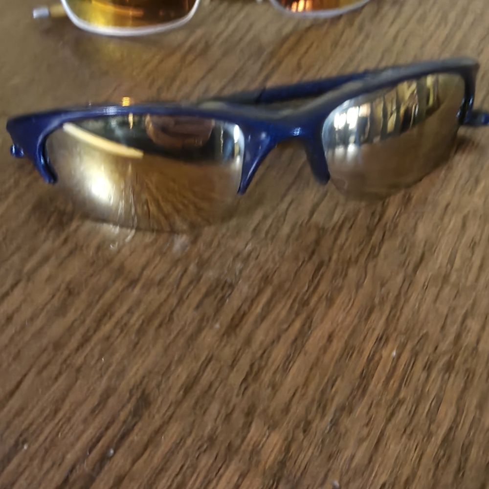 2 Pair Okley Sunglasses